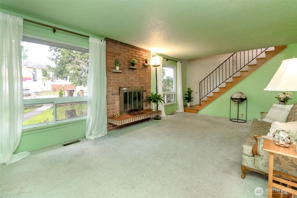 Photo of 215 E 48th St St, Tacoma, WA 98404 (MLS # 2482935)