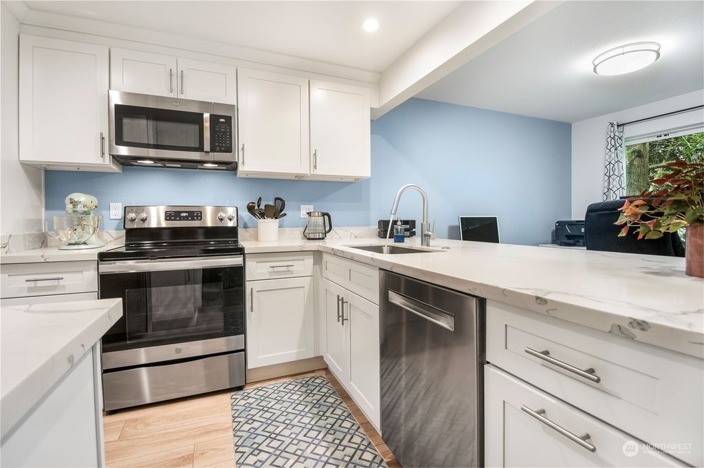 Photo of 12704 NE 144th Street #A104, Kirkland, WA 98034 (MLS # 2277227)