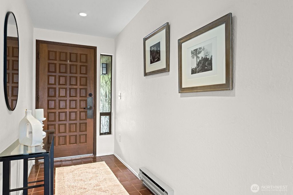 Photo of 6714 Park Point Way NE, Seattle, WA 98115 (MLS # 2427163)