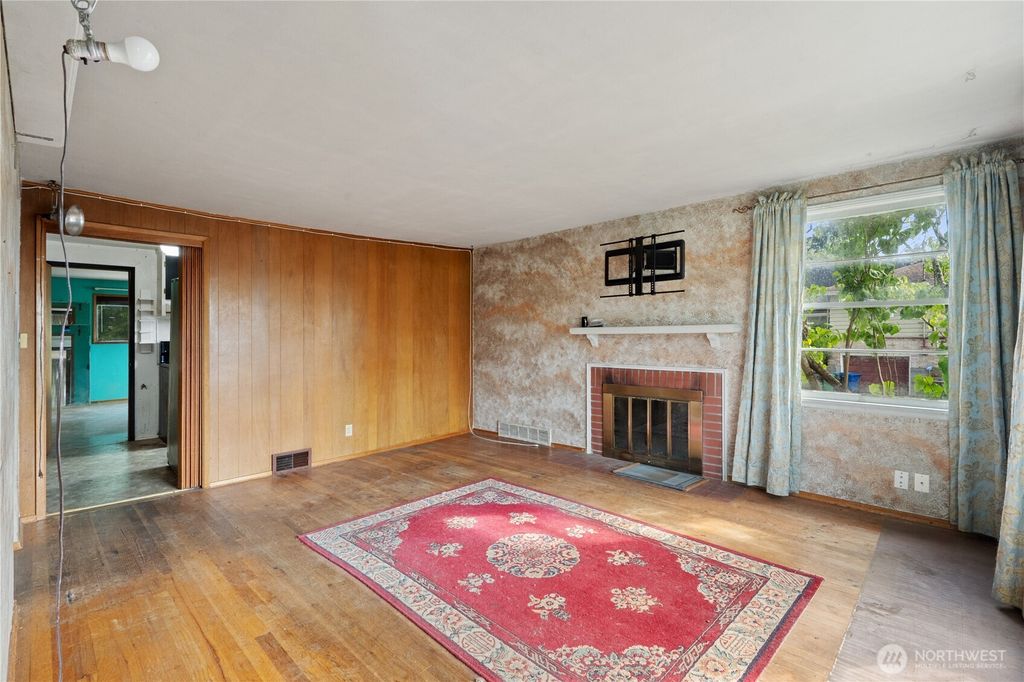 Photo of 3002 NW 66th Street, Seattle, WA 98117 (MLS # 2431845)