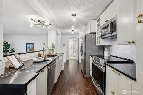 Photo of 3700 26th Place W #203, Seattle, WA 98199 (MLS # 2455851)