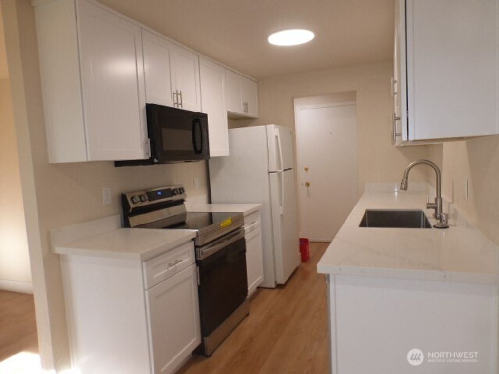 Photo of 15721 NE 18TH Street #D2, Bellevue, WA 98008 (MLS # 2515060)