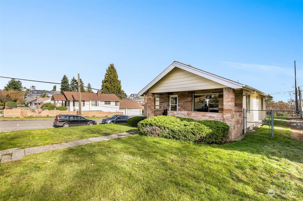Photo of 4400 37th Avenue SW, Seattle, WA 98126 (MLS # 2195717)