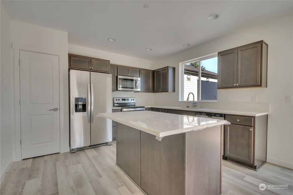 Photo of 11507 12th Avenue S, Burien, WA 98168 (MLS # 2138272)