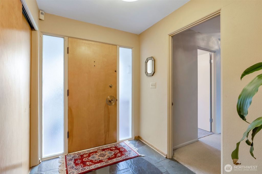 Photo of 10520 11th Avenue NW, Seattle, WA 98177 (MLS # 2507384)