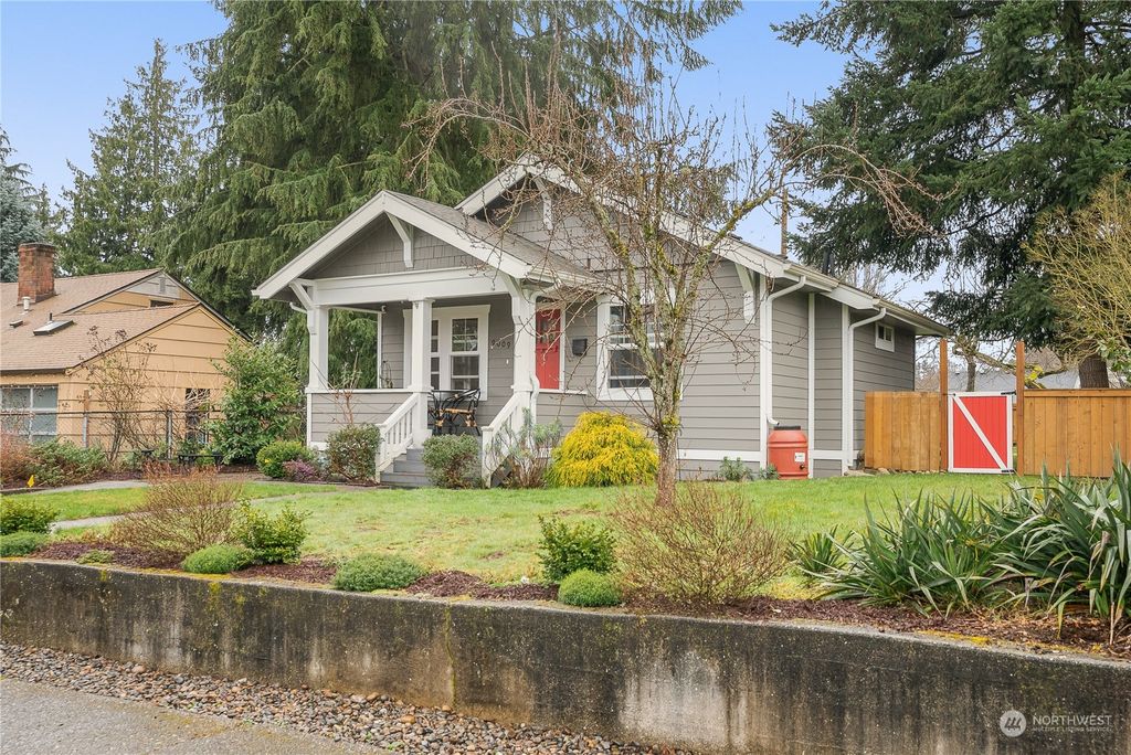 Photo of 9009 32nd Avenue SW, Seattle, WA 98126 (MLS # 2198402)
