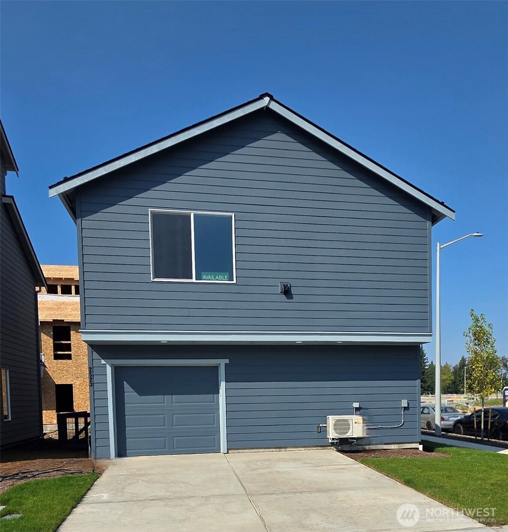 Photo of 15917 23rd Ave NE Ave, Marysville, WA 98271 (MLS # 2404041)