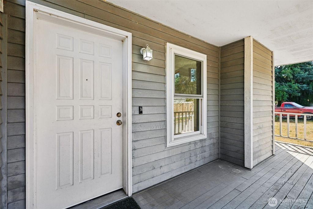 Photo of 3000 SW 106th Street, Seattle, WA 98146 (MLS # 2401396)