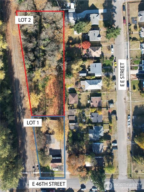 Photo of 421 E 46th Street, Tacoma, WA 98404 (MLS # 2496133)
