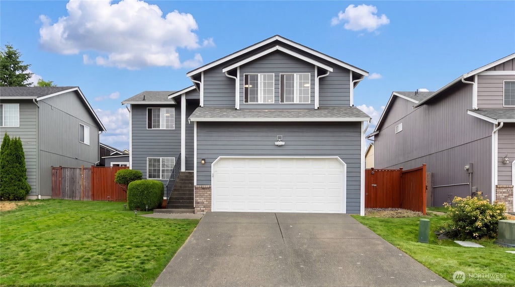 Photo of 1115 S 90th Street Ct, Tacoma, WA 98444 (MLS # 2569918)