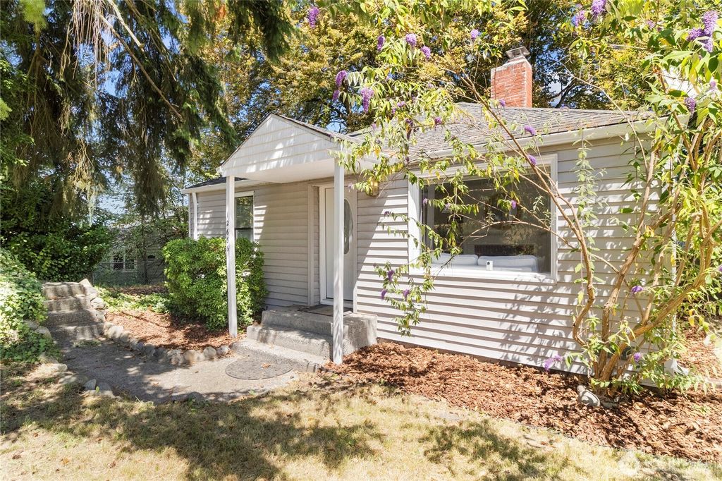Photo of 12656 74th Place S, Seattle, WA 98178 (MLS # 2402050)