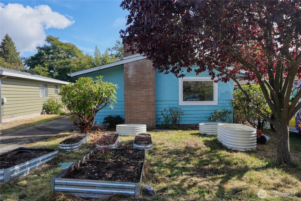 Photo of 9016 12th Avenue NW, Seattle, WA 98117 (MLS # 2589269)