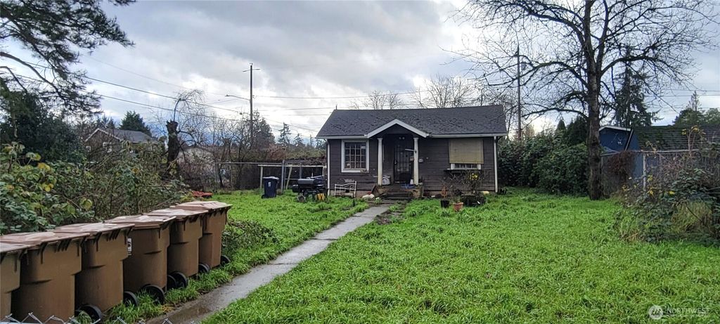 Photo of 830 E 66th Street, Tacoma, WA 98404 (MLS # 2464008)