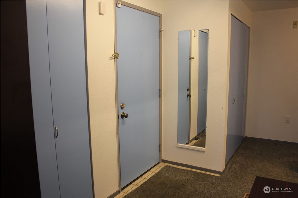 Photo of 11002 SE Petrovitsky Road #F 203, Renton, WA 98055 (MLS # 2067126)