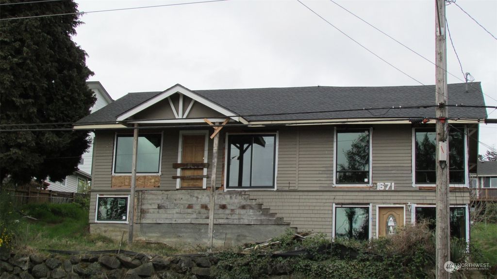 Photo of 10671 Rainier Avenue S, Seattle, WA 98178 (MLS # 2228553)