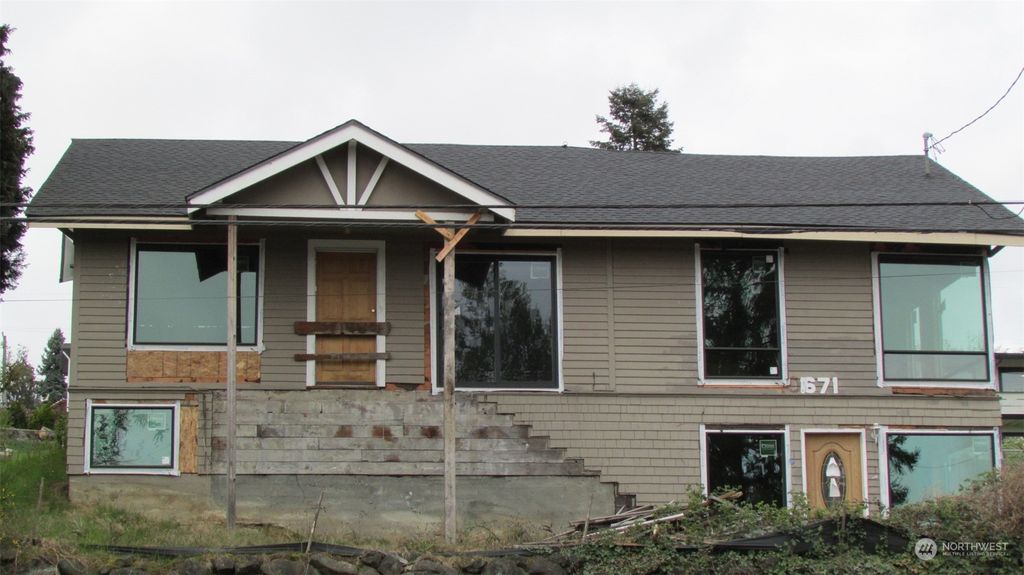 Photo of 10671 Rainier Avenue S, Seattle, WA 98178 (MLS # 2228553)