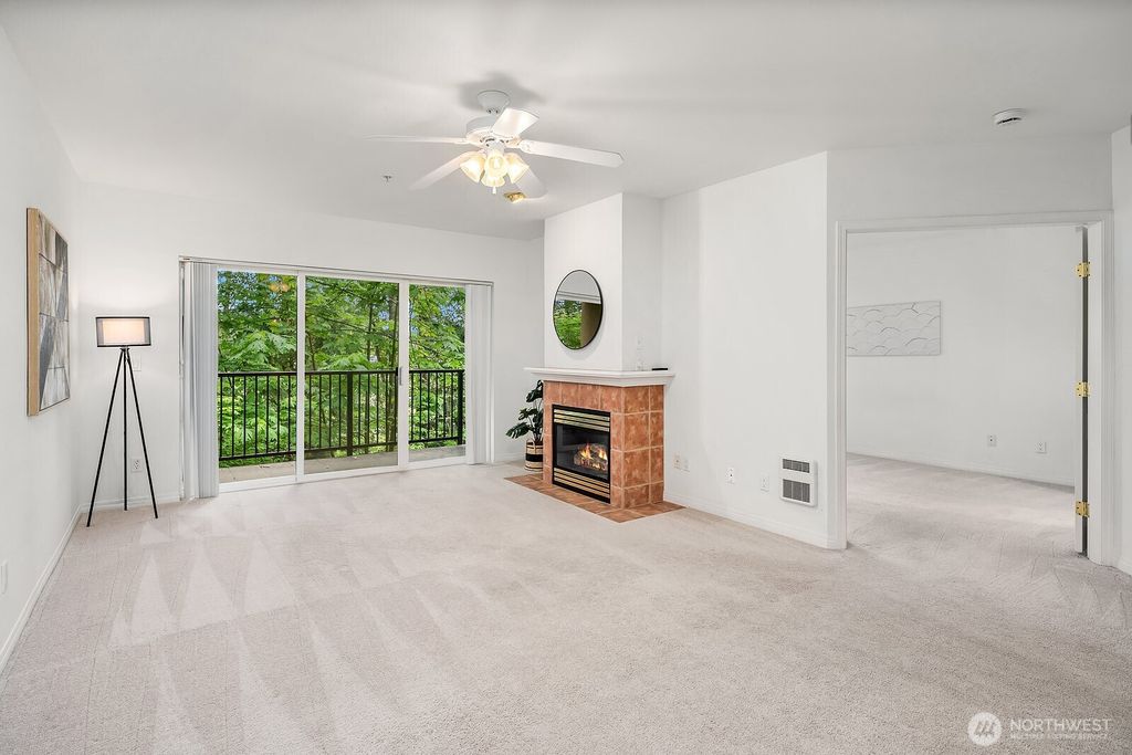 Photo of 12439 NE Totem Lake Way #106, Kirkland, WA 98034 (MLS # 2448483)