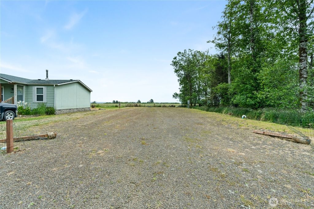 Photo of 556 Duck Lake Drive NE, Ocean Shores, WA 98569 (MLS # 2524235)