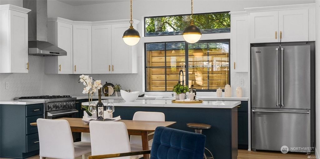 Photo of 8717 13th Avenue NW, Seattle, WA 98117 (MLS # 2156575)