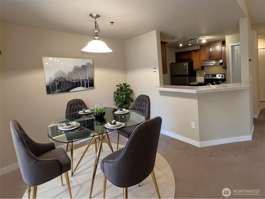 Photo of 11527 HWY99 #D 303, Everett, WA 98204 (MLS # 2527748)