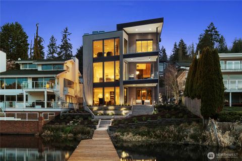 Photo of 9810 SE Shoreland Drive, Bellevue, WA 98004 (MLS # 2354028)