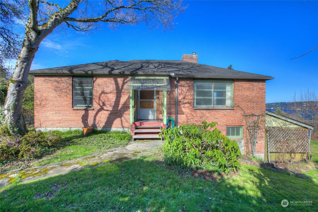 Photo of 10250 SE Waters Ave S Ave, Seattle, WA 98178 (MLS # 2202197)