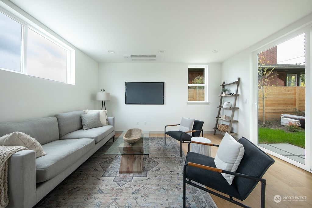 Photo of 8310 9th Avenue NW, Seattle, WA 98117 (MLS # 2232401)