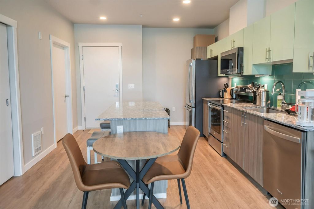 Photo of 1085 103rd Avenue NE #619, Bellevue, WA 98004 (MLS # 2394275)