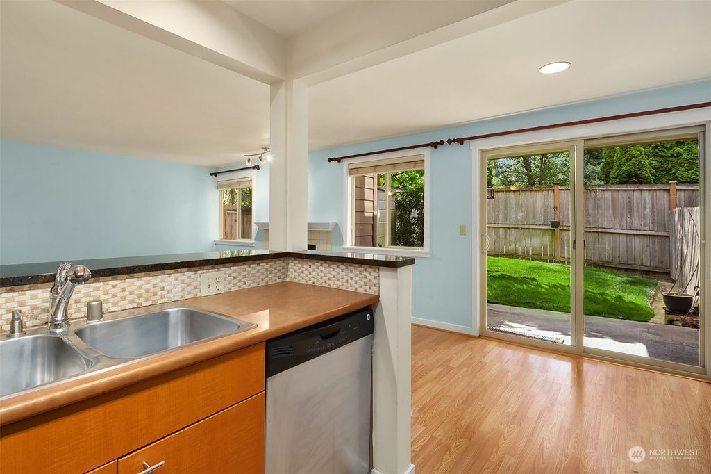 Photo of 8240 126th Avenue NE #A102, Kirkland, WA 98033 (MLS # 2159665)