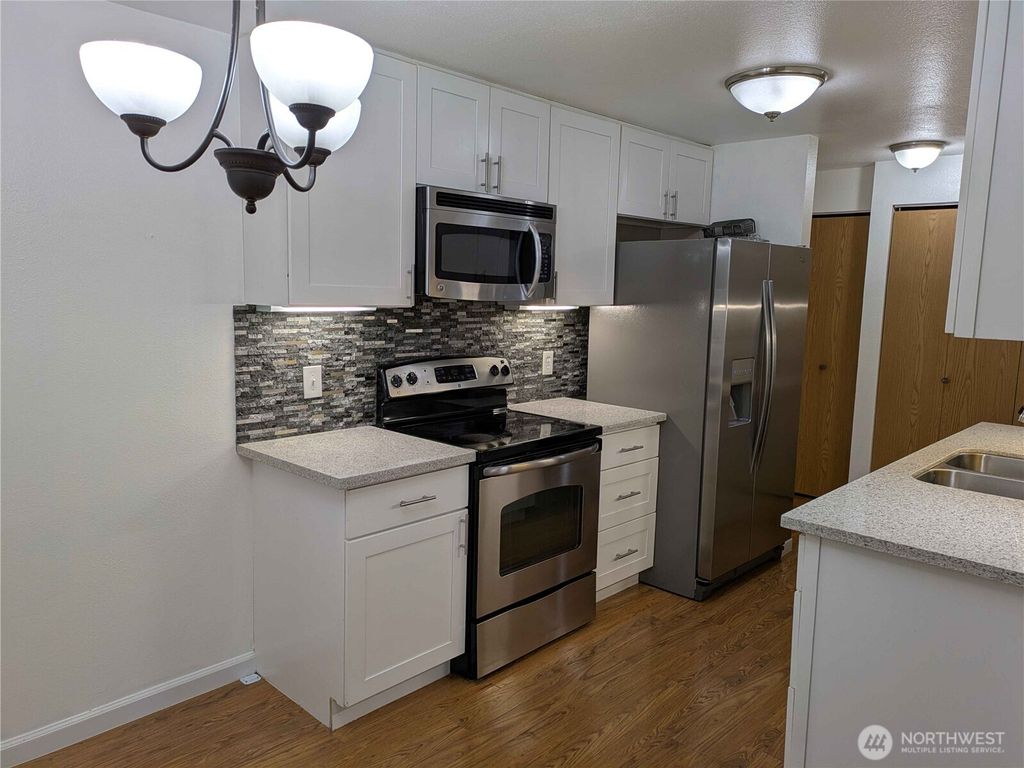 Photo of 10501 8th Avenue NE #115, Seattle, WA 98125 (MLS # 2439416)