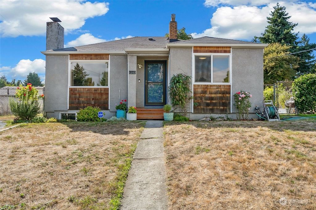 Photo of 12463 10th Avenue S, Seattle, WA 98168 (MLS # 2157445)