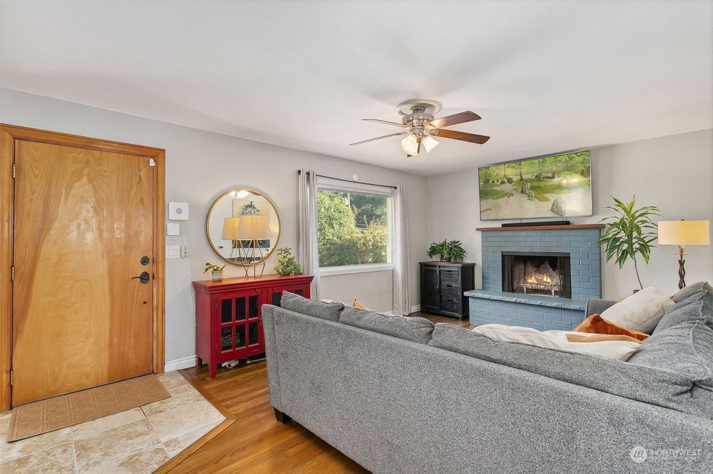 Photo of 12463 10th Avenue S, Seattle, WA 98168 (MLS # 2157445)