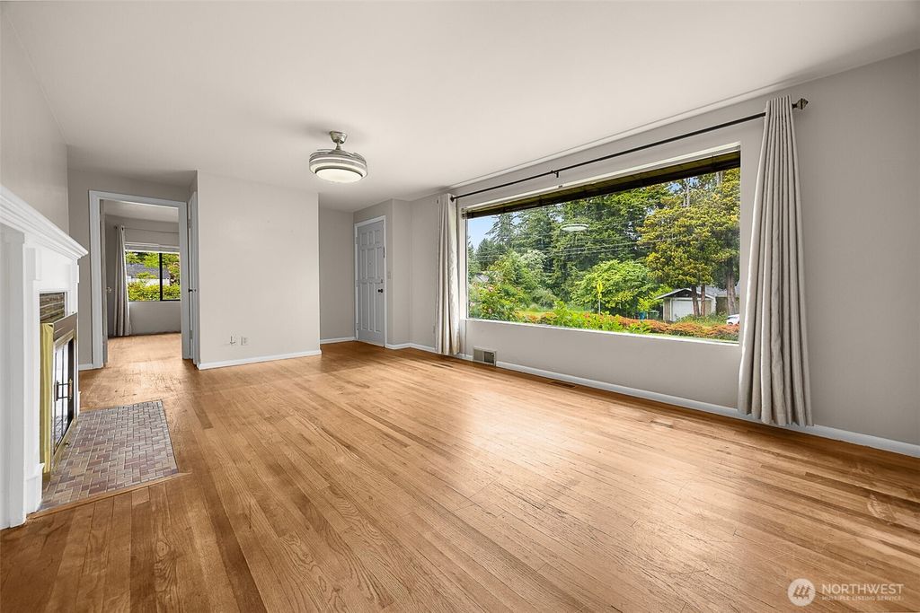 Photo of 15557 Ashworth Avenue N, Shoreline, WA 98133 (MLS # 2385060)