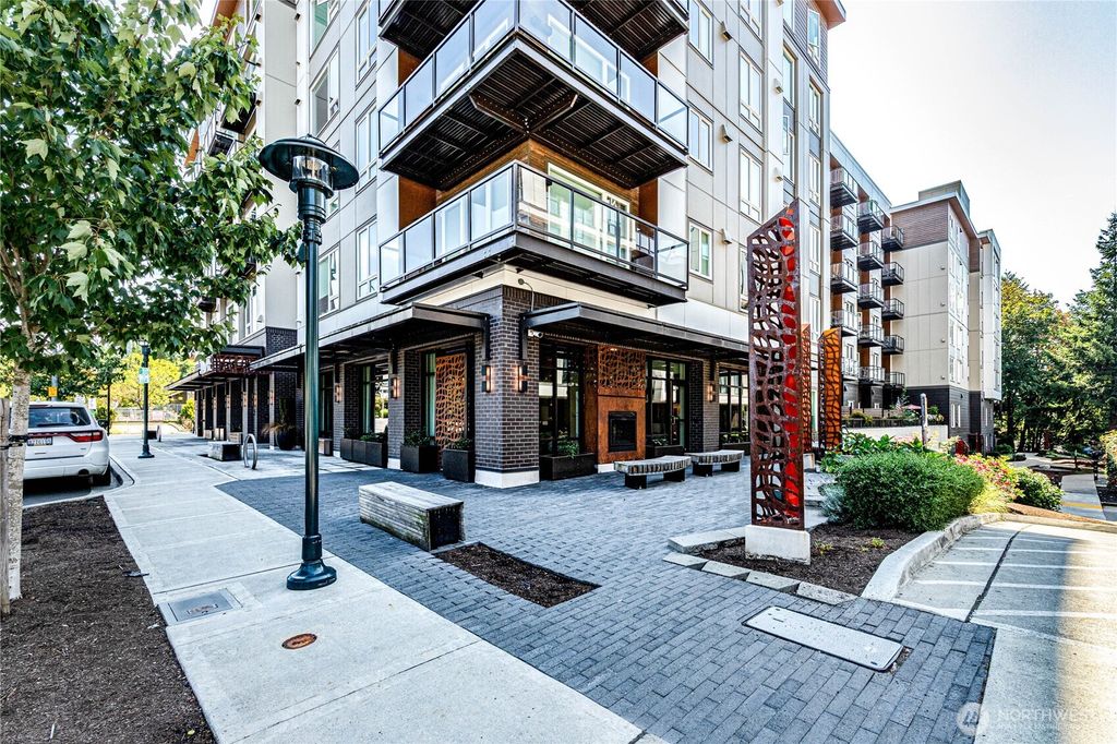 Photo of 11903 NE 128th Street #214, Kirkland, WA 98034 (MLS # 2425234)