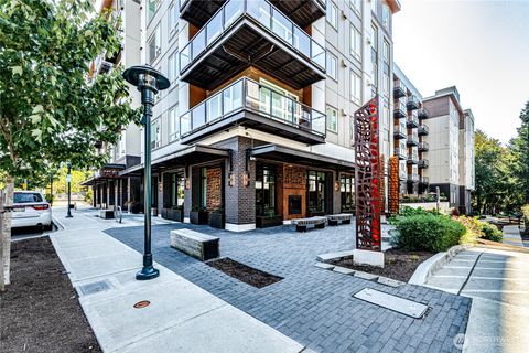Photo of 11903 NE 128th Street #214, Kirkland, WA 98034 (MLS # 2425234)