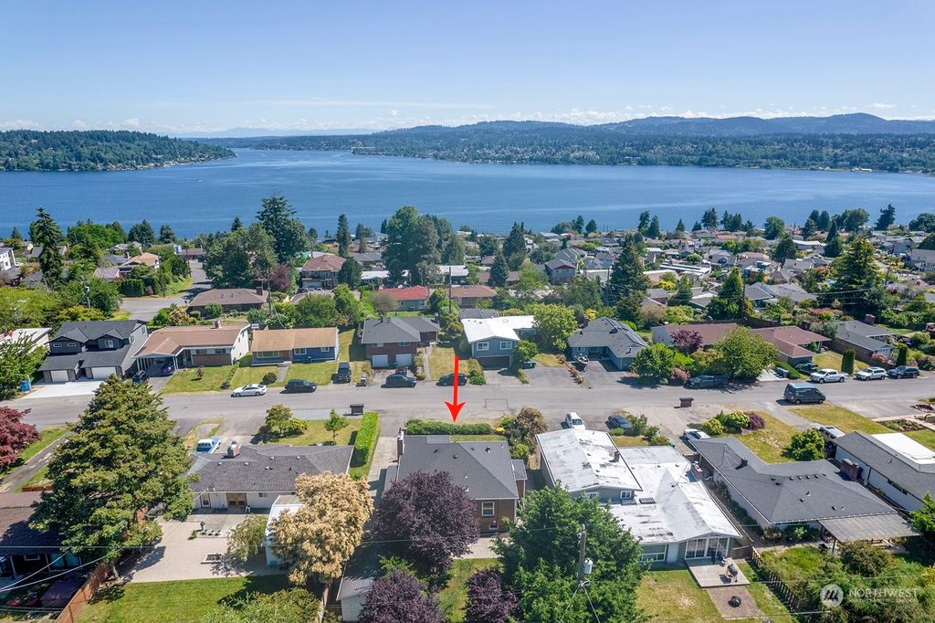 Photo of 7729 S Mission Drive, Seattle, WA 98178 (MLS # 2270078)