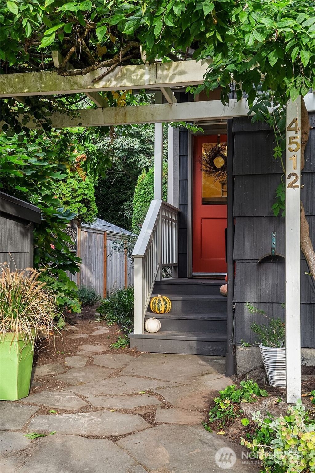 Photo of 4512 35th Avenue W, Seattle, WA 98199 (MLS # 2438417)