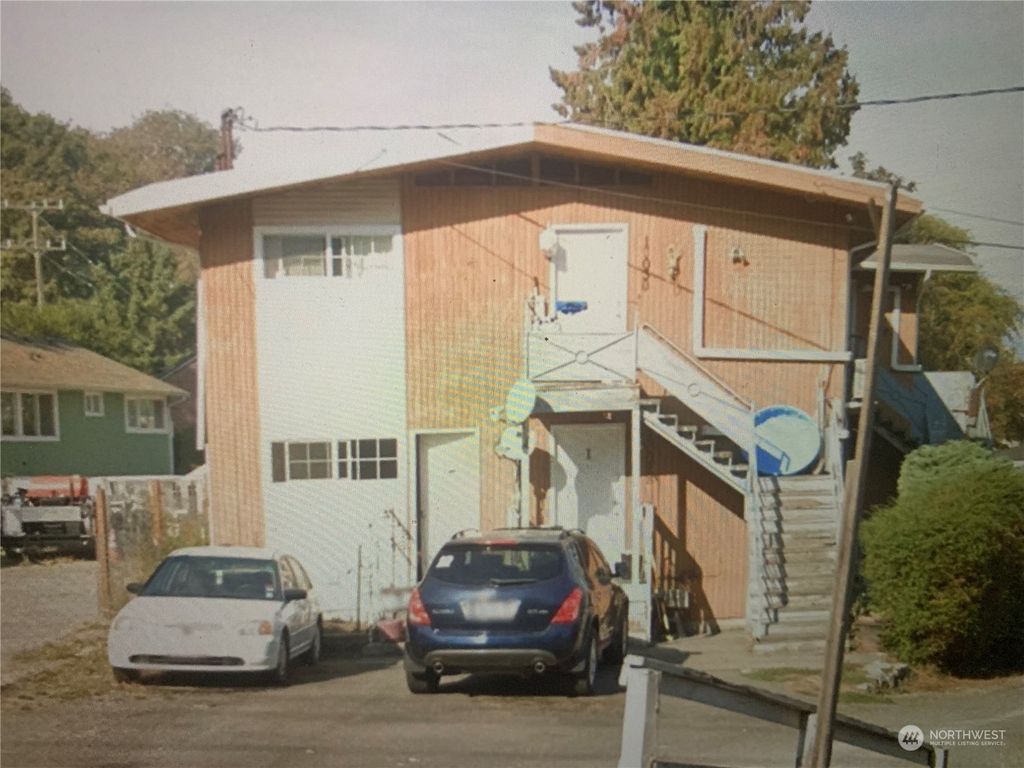Photo of 10015 17th Place S, Seattle, WA 98168 (MLS # 2318465)