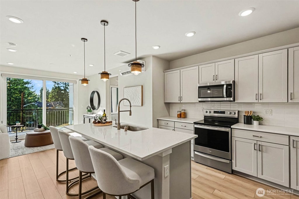 Photo of 14598 Westminster Way N #304, Shoreline, WA 98133 (MLS # 2582623)
