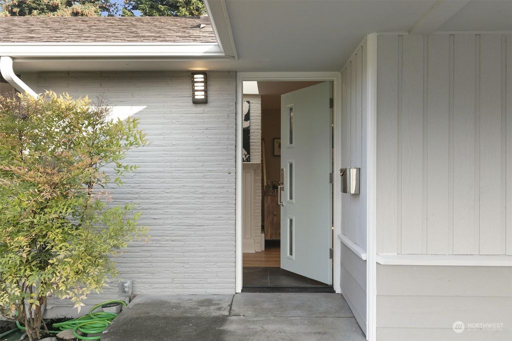 Photo of 8706 Jones Place NW, Seattle, WA 98117 (MLS # 2010419)