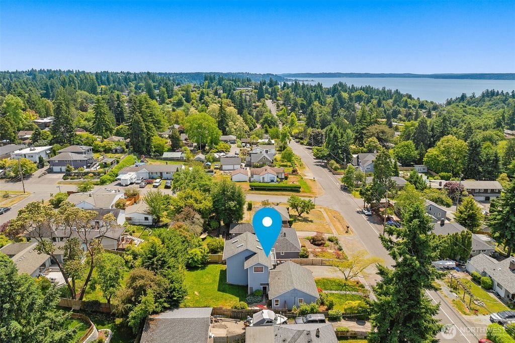 Photo of 10746 28th Avenue SW, Seattle, WA 98146 (MLS # 2386605)