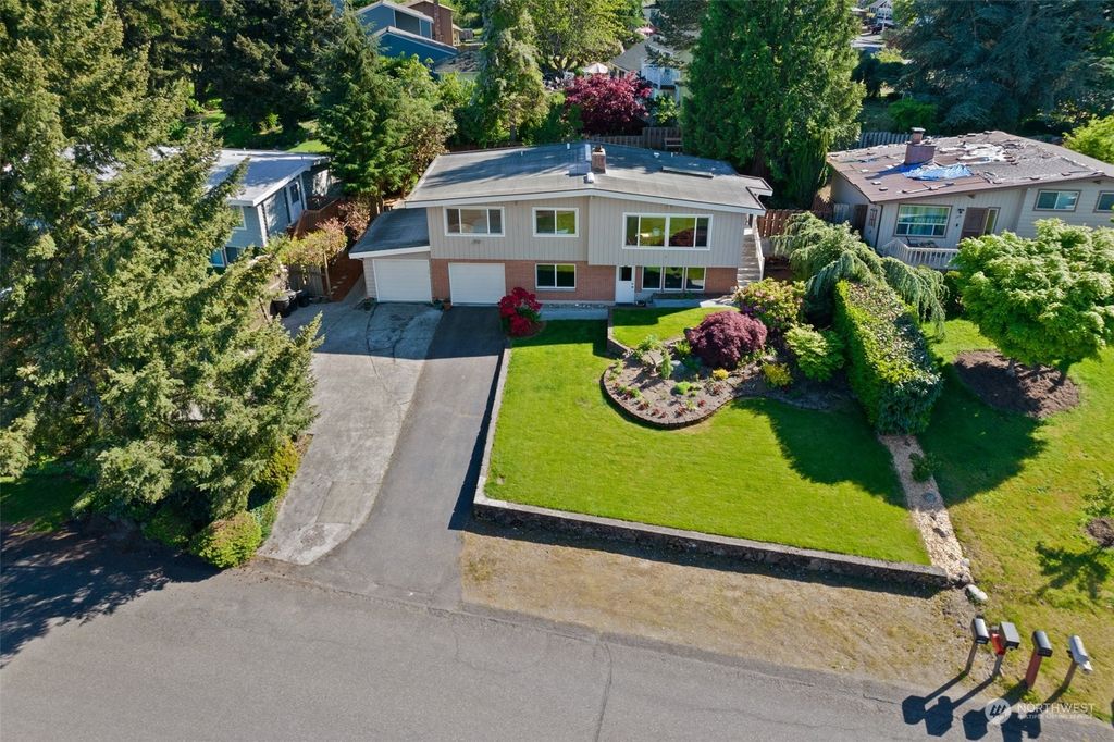 Photo of 5121 S 164th St St, Tukwila, WA 98188 (MLS # 2236215)