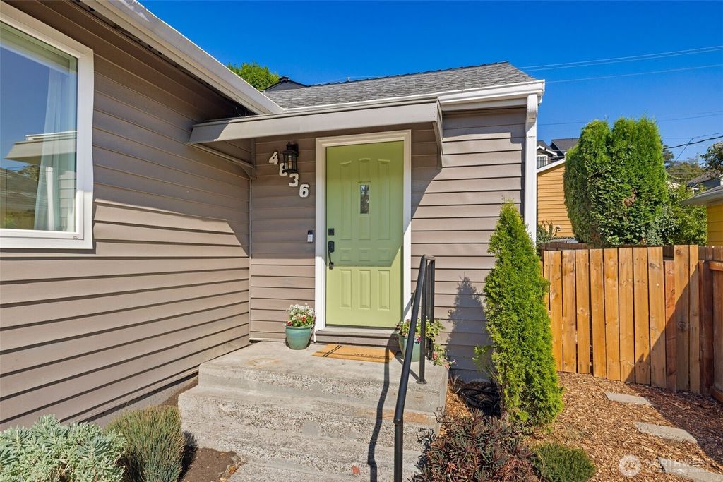 Photo of 4836 25th Avenue SW, Seattle, WA 98106 (MLS # 2420505)