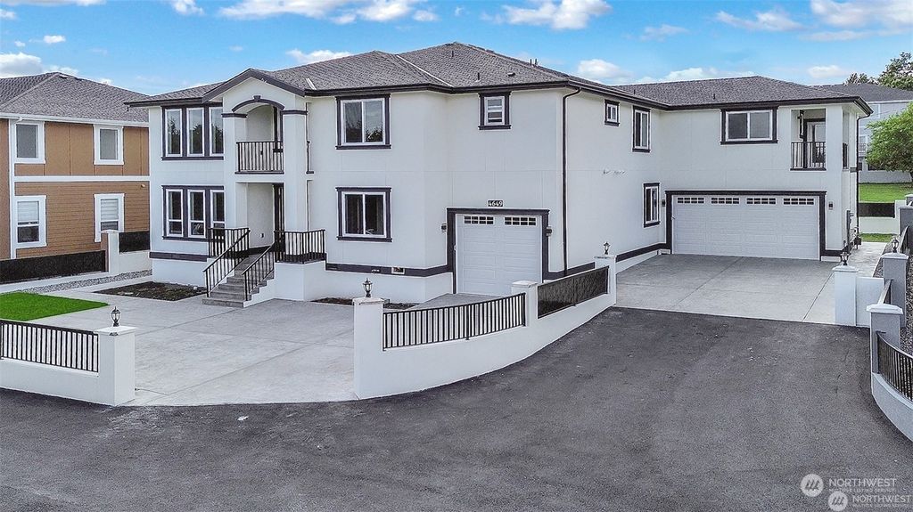 Photo of 4649 S 146th Street, Tukwila, WA 98168 (MLS # 2309892)
