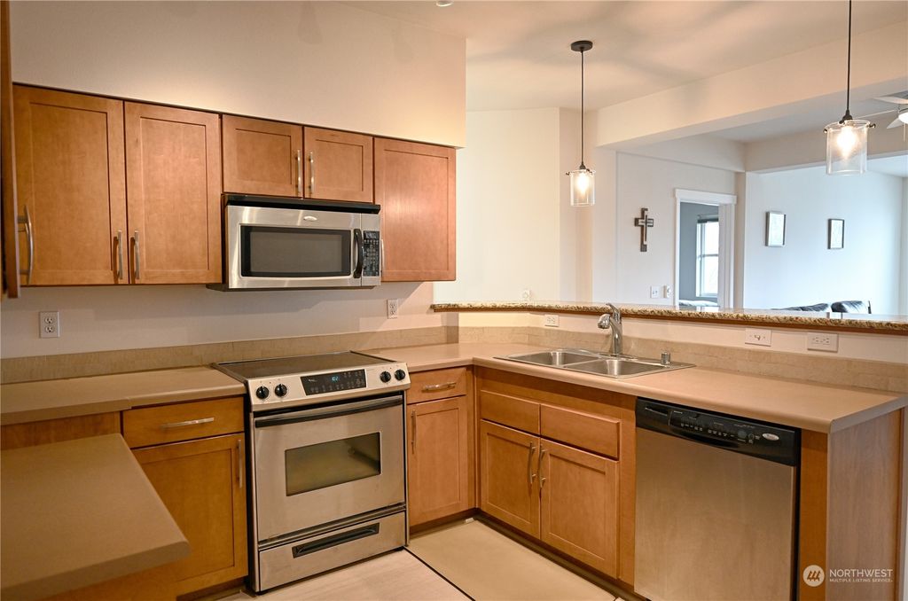 Photo of 2960 SW Raymond Street #101, Seattle, WA 98126 (MLS # 2048621)