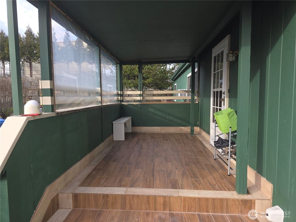 Photo of 7514 18th Avenue Ct E #12, Tacoma, WA 98404 (MLS # 2471964)