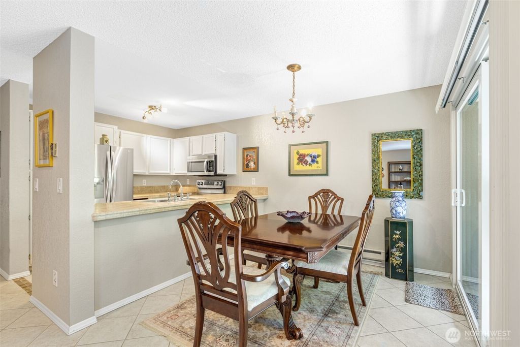 Photo of 1208 S 216th Street #103D, Des Moines, WA 98198 (MLS # 2403803)