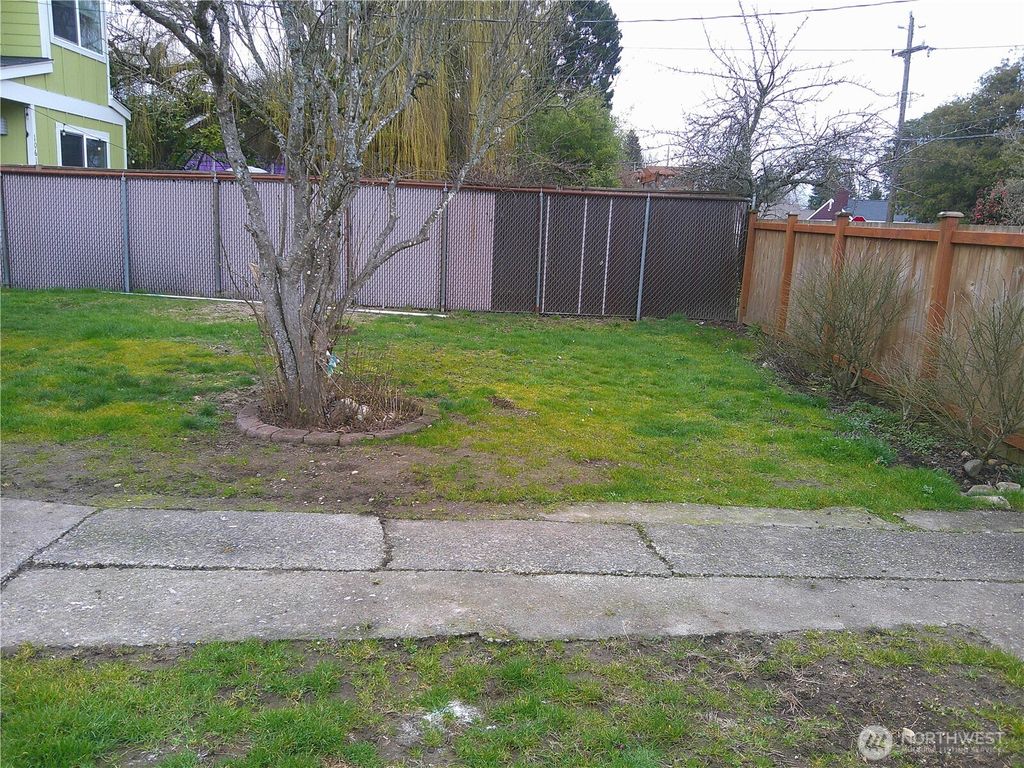 Photo of 10615 18th Avenue SW, Seattle, WA 98146 (MLS # 2488497)