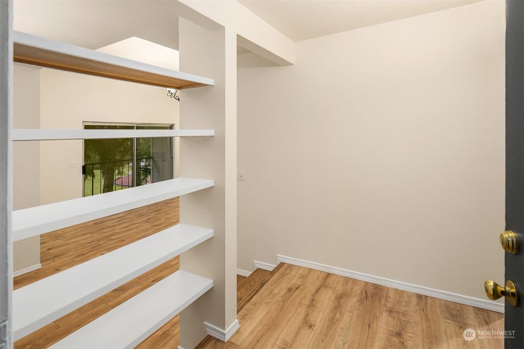 Photo of 4647 W Lake Sammamish Parkway SE #E302, Issaquah, WA 98027 (MLS # 2031490)