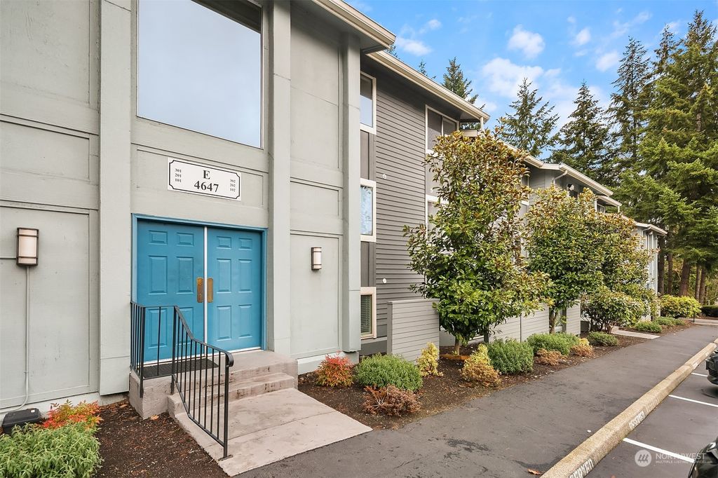 Photo of 4647 W Lake Sammamish Parkway SE #E302, Issaquah, WA 98027 (MLS # 2031490)
